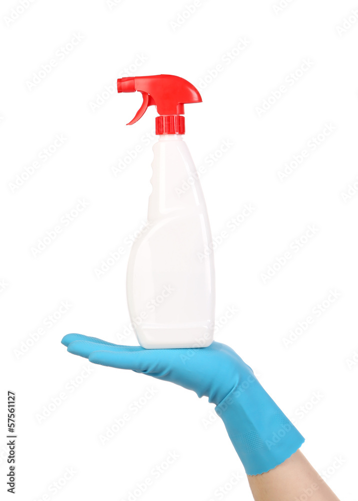Hand in glove holding white plastic spray bottle Hand in glove holding white plastic spray bottle