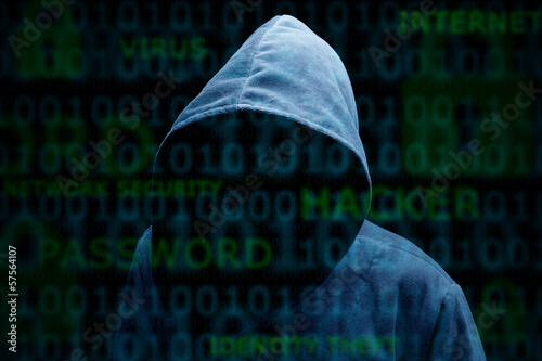 Hooded silhouette of a hacker photo