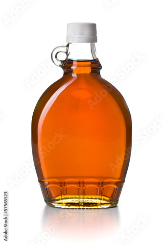 Valokuva maple syrup in glass bottle