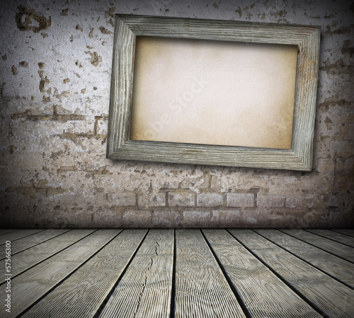 Old board on brick wall