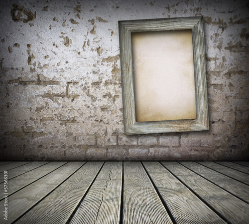Old board on brick wall