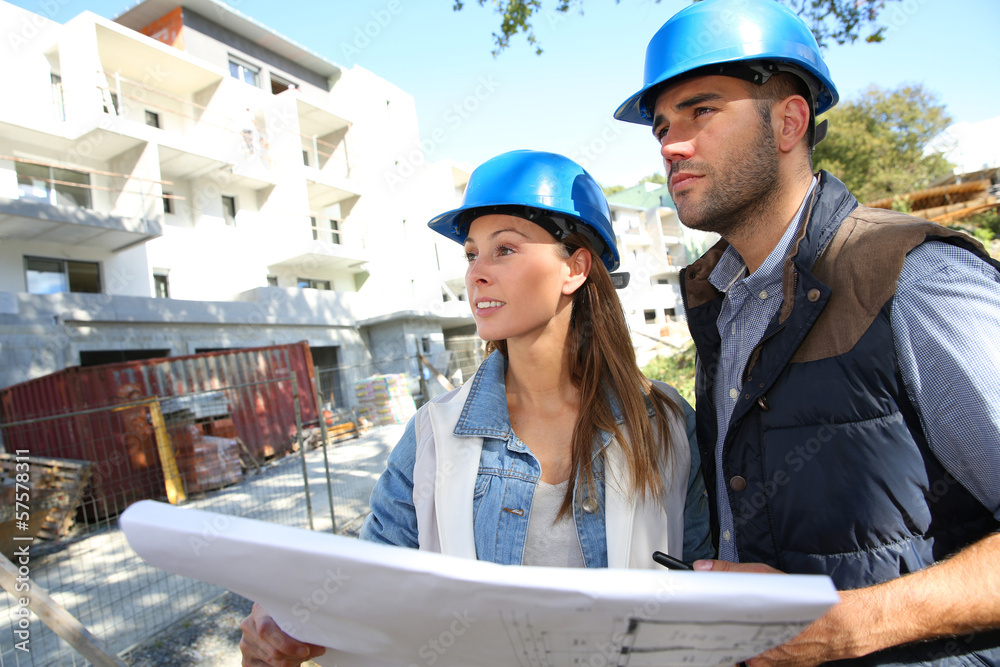 Construction engineers working together on site Construction engineers working together on site