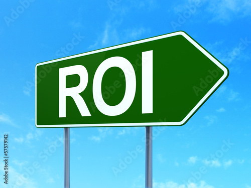 Finance concept: ROI on road sign background