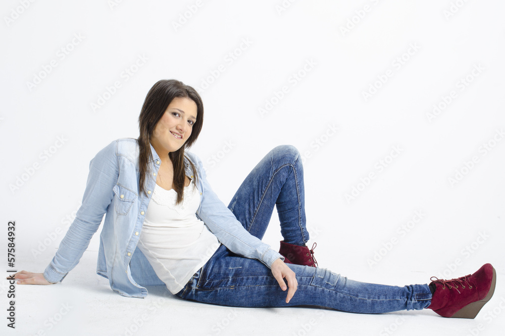 real young cute woman posing over a white background real young cute woman posing over a white background