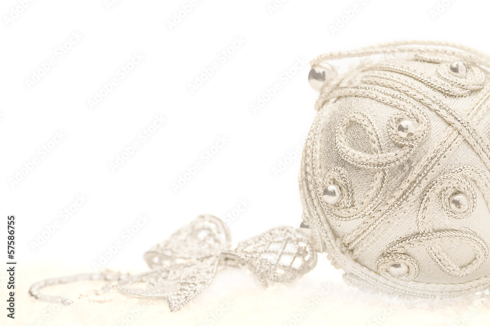 Obraz premium Silver Christmas decorations on white with copyspace