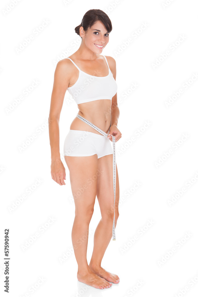 Fototapeta premium Young Woman With Measure Tape