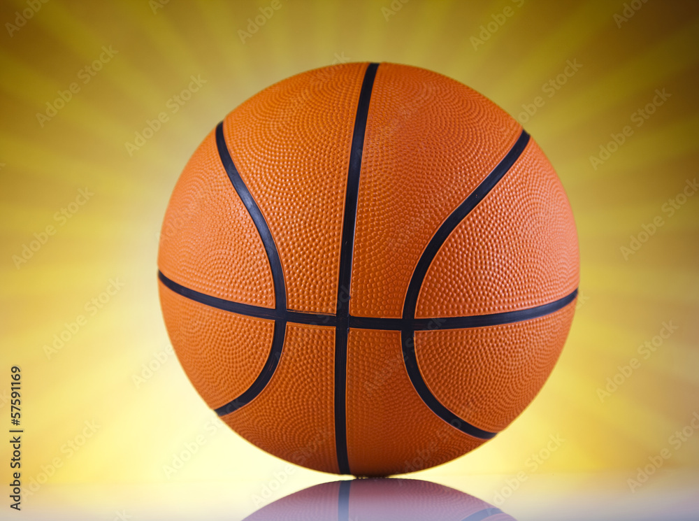 Fototapeta premium Basketball ball over sunshine