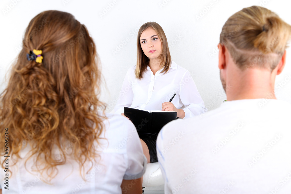 Young couple with problem on reception for family psychologist Young couple with problem on reception for family psychologist