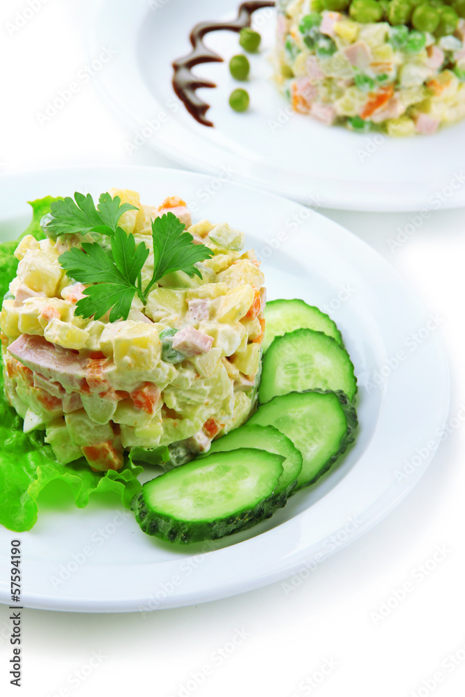 Russian traditional salad Olivier, isolated on white Russian traditional salad Olivier, isolated on white
