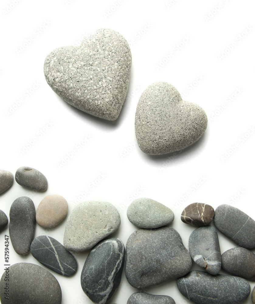 Grey stones in shape of heart, isolated on white Grey stones in shape of heart, isolated on white
