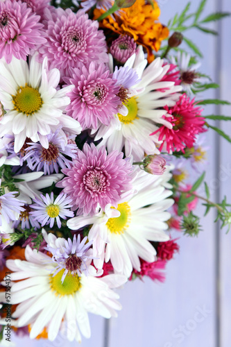 Fototapeta Naklejka Na Ścianę i Meble -  Wildflowers on wooden table