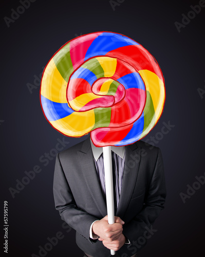 Wallpaper Mural Businessman holding a lollipop Torontodigital.ca