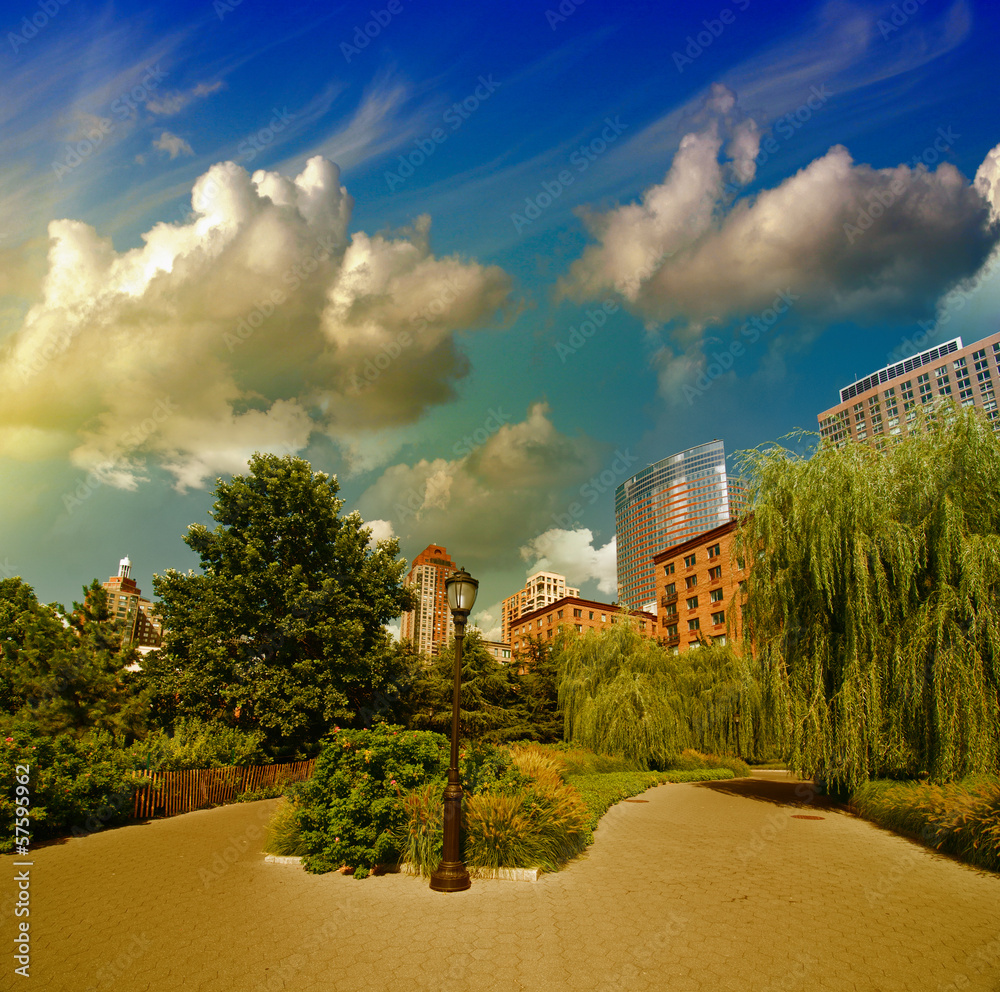 Obraz premium New York City, Battery Park area. Beautiful view of Trees and Sk