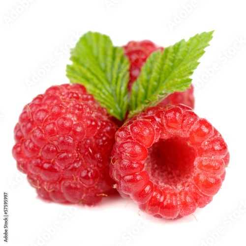 Red Raspberries with Green Leaves Close-Up Isolated on White