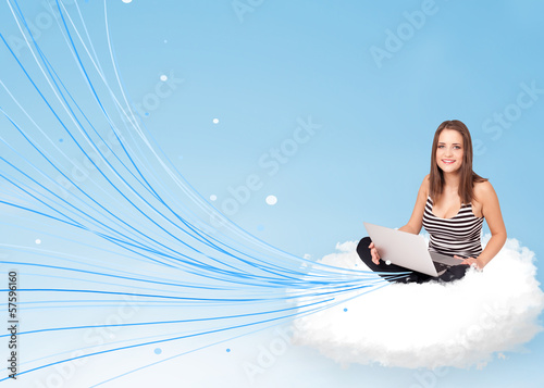 Young woman sitting in cloud with laptop
