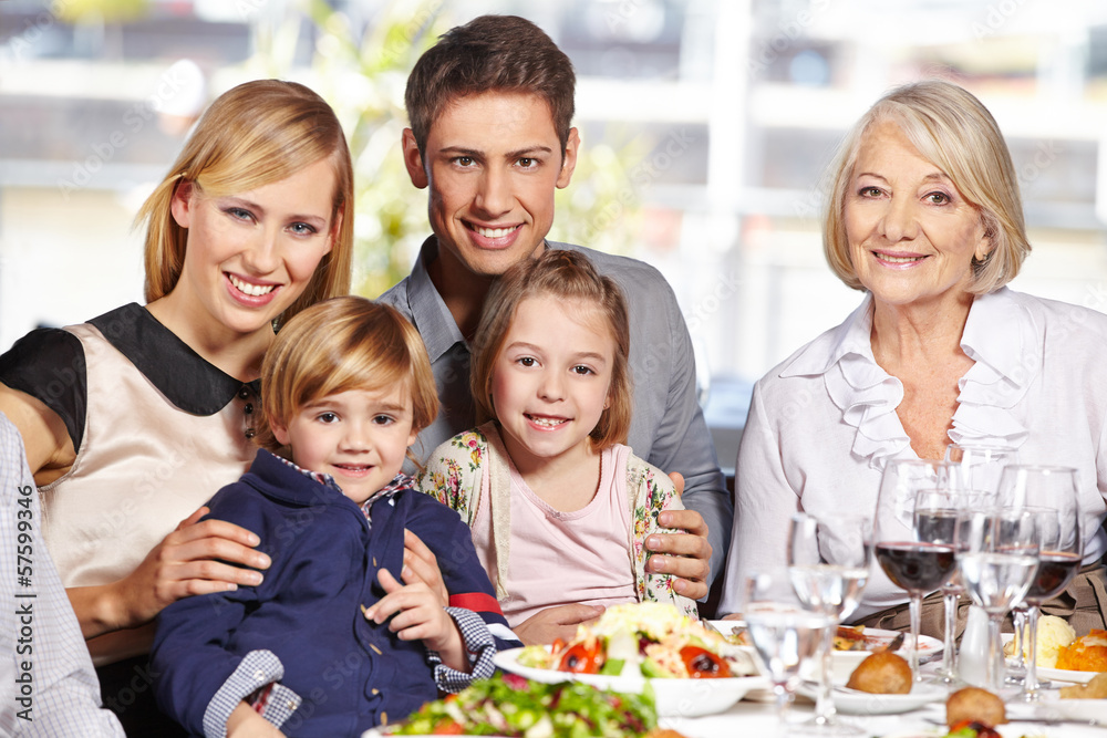 Happy family at lunch table Happy family at lunch table