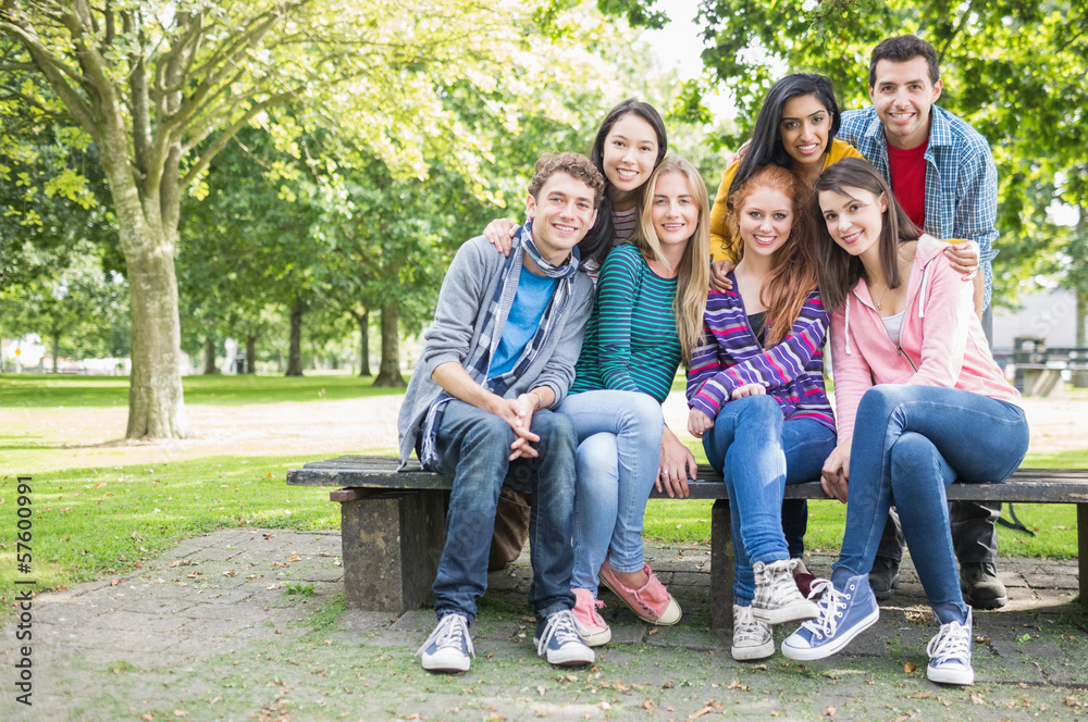 Fototapeta premium Portrait of young college students in park