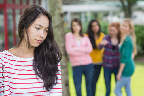 Student being bullied by a group of students