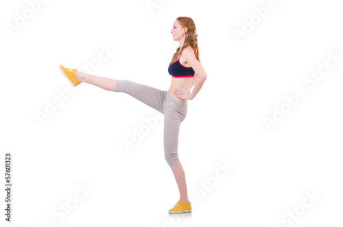 Young woman doing exercises on white