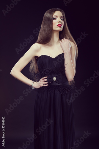 photo of a glamour woman wearing black evening dress