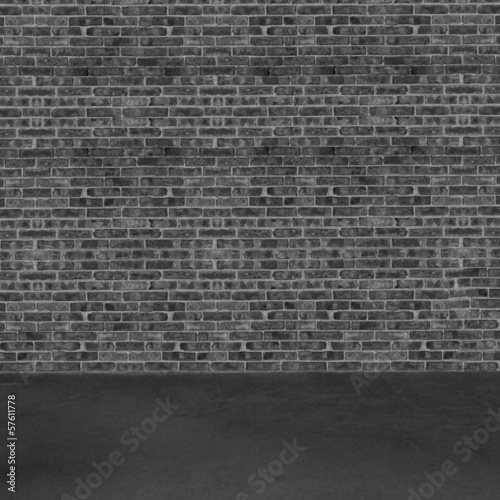 Room interior with black and white brick wall and concrete floor