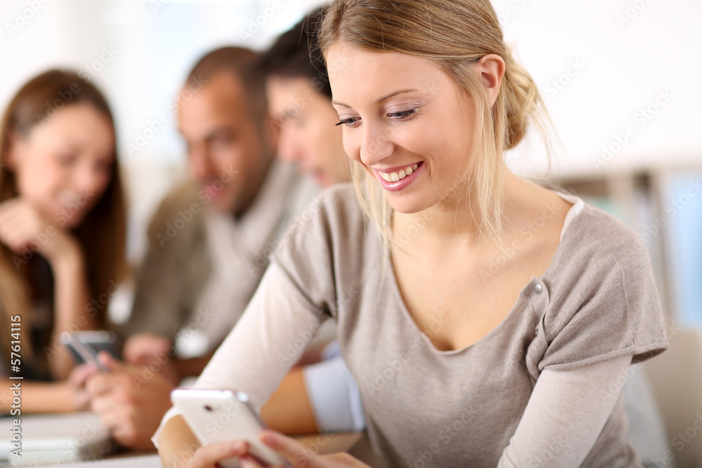 Portrait of attractive young woman using cellphone Portrait of attractive young woman using cellphone