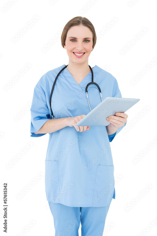 Female doctor pointing at a tablet Female doctor pointing at a tablet