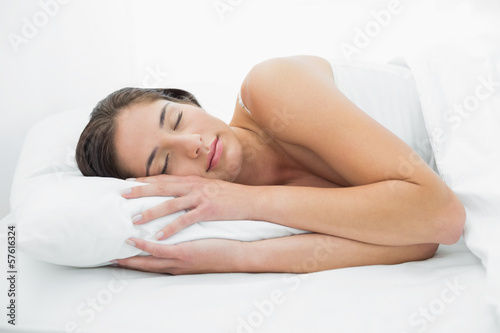Pretty woman sleeping in bed