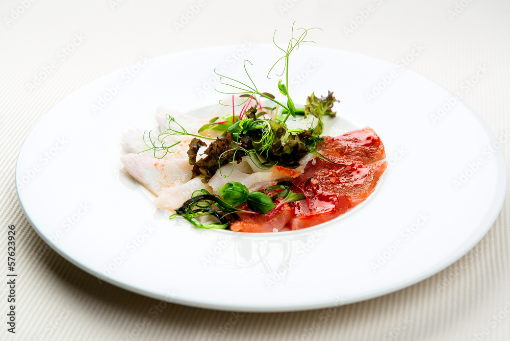 Cold appetizer, slices of trout and herring Cold appetizer, slices of trout and herring