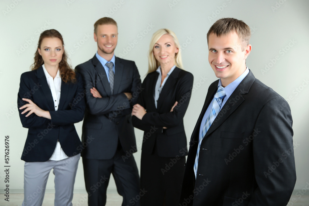 Group of business people on gray background Group of business people on gray background