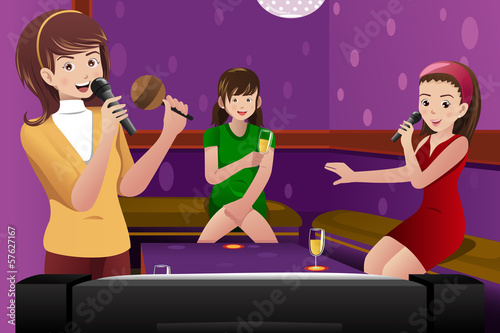 Female  friends singing karaoke