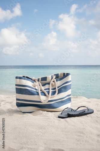 beach bag and flip flops