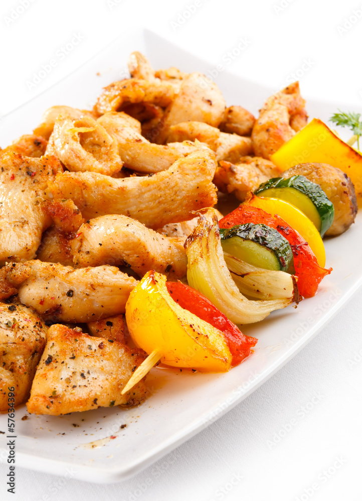 Grilled meat and vegetables on white background Grilled meat and vegetables on white background