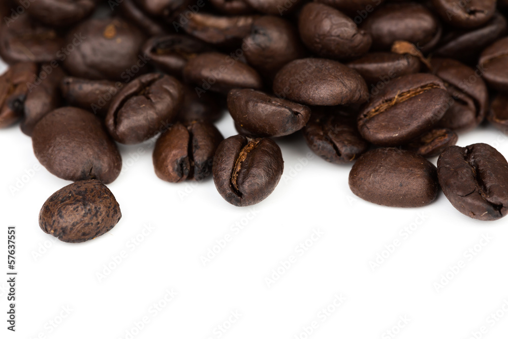 Brown coffee beans isolated on white background Brown coffee beans isolated on white background