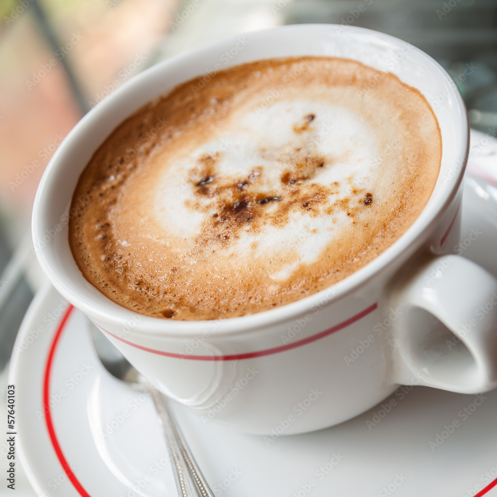 Coffee on a glass table