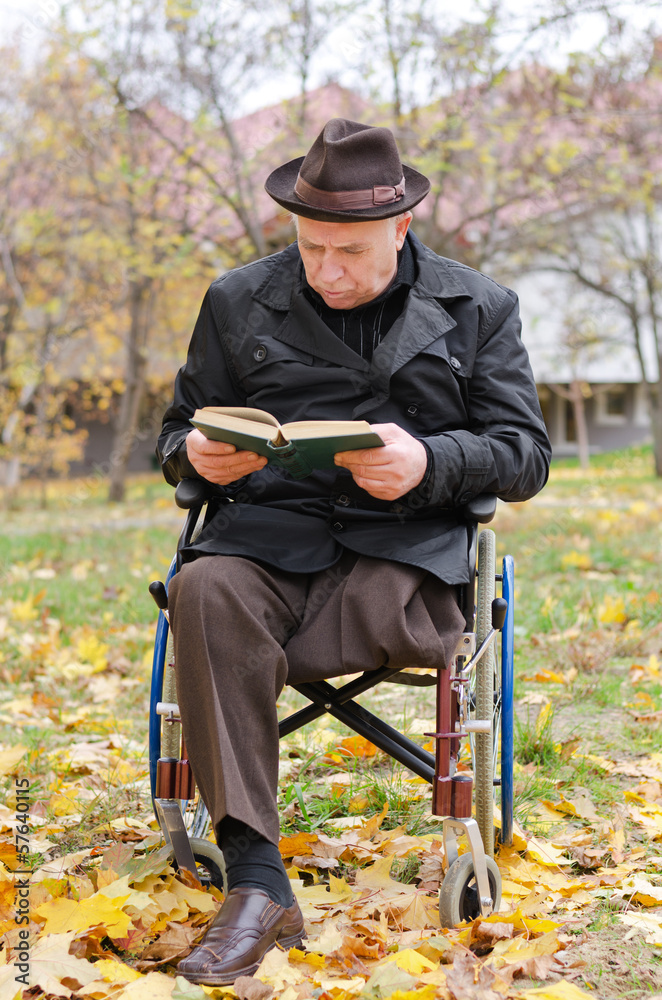 Handicapped elderly man in a wheelchair