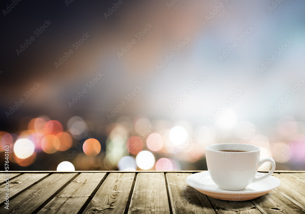 Fototapeta premium coffee on table in the night city