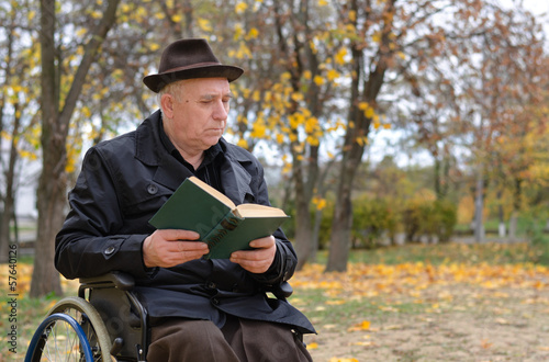 Handicapped elderly man in a wheelchair