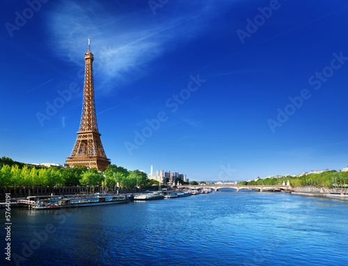 Seine in Paris with Eiffel tower in sunrise time © Iakov Kalinin