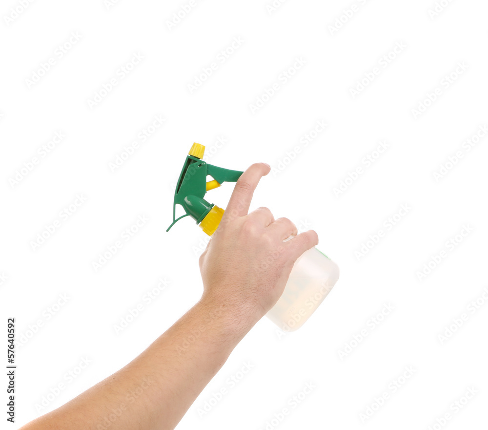 Hand holding white plastic spray bottle Hand holding white plastic spray bottle