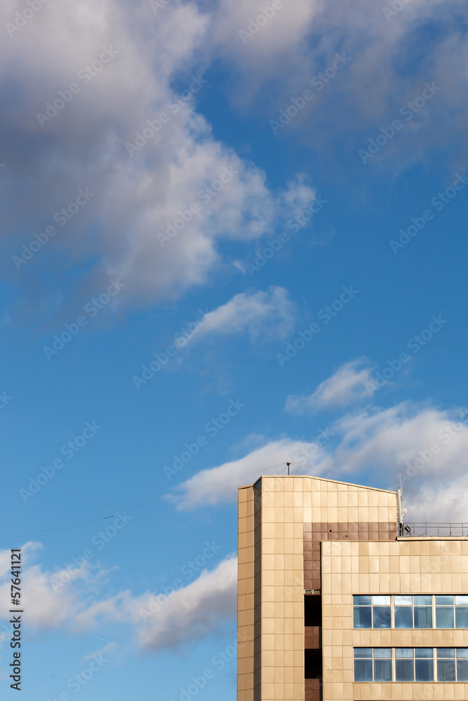 industrial building against the sky with clouds industrial building against the sky with clouds