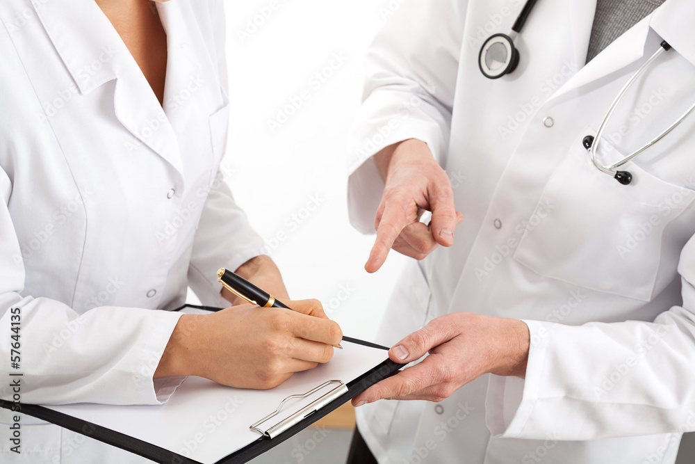 Physician explaining medical problem Physician explaining medical problem