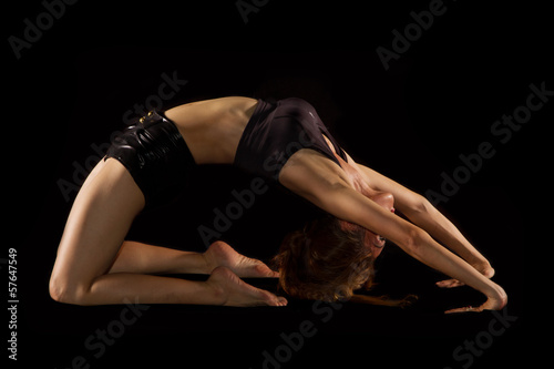 yoga female doing yogatic exericise photo