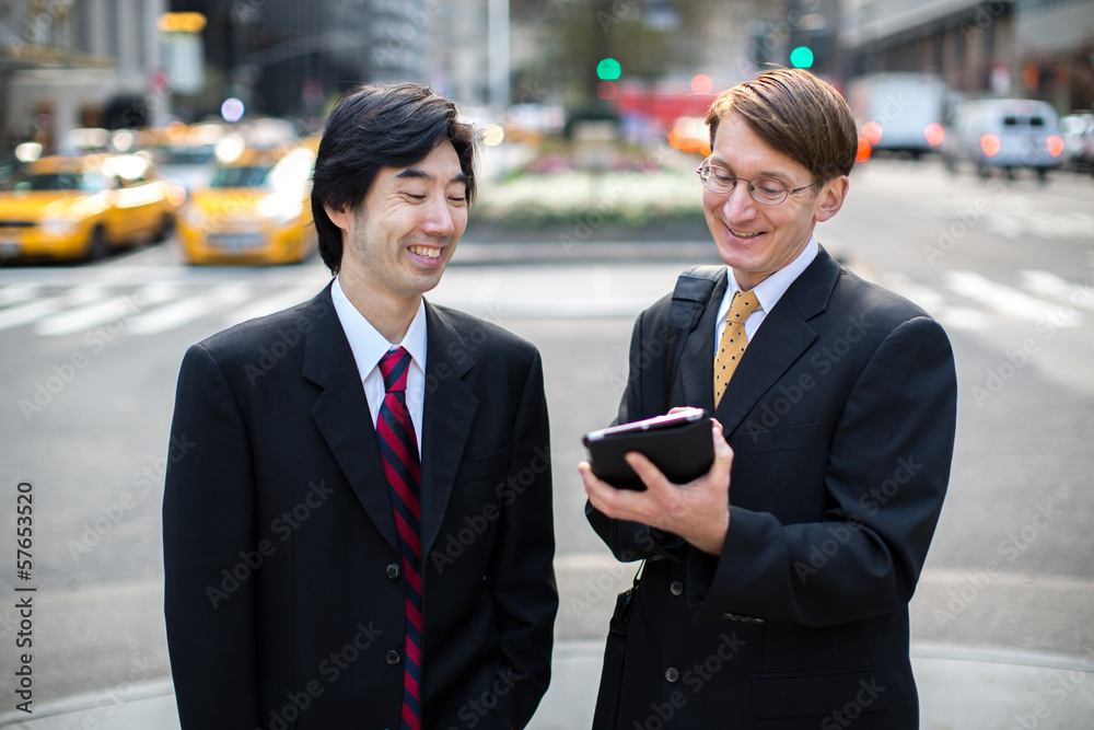 Asian and caucasian businessman in New York City