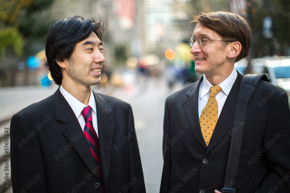 Asian and caucasian businessman in New York City Asian and caucasian businessman in New York City