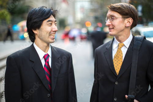 Asian and caucasian businessman in New York City