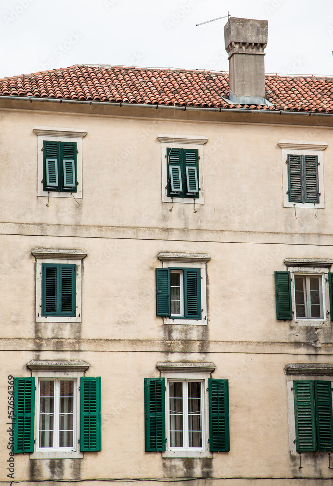 Old Building in Kotor with Green Shutters