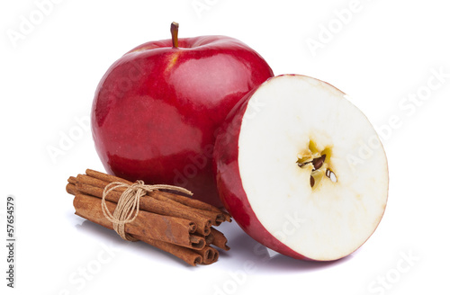 Apples and cinnamon on white background
