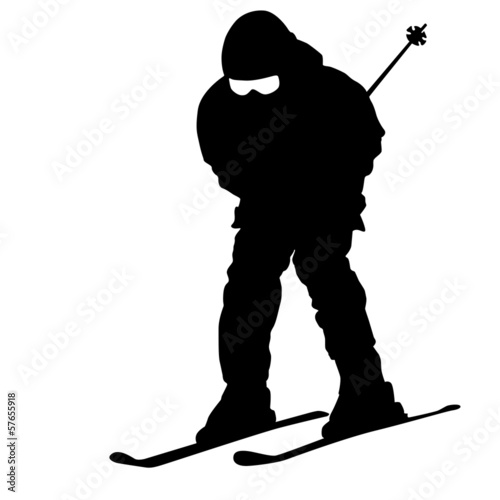 Mountain skier  speeding down slope. Vector sport silhouette.