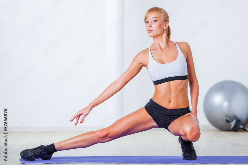 woman stretching muscles woman stretching muscles